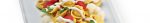 Tortellini bolognesi su crema di cavolfiore alla curcuma, pomodorini canditi e fonduta di caciocavallo